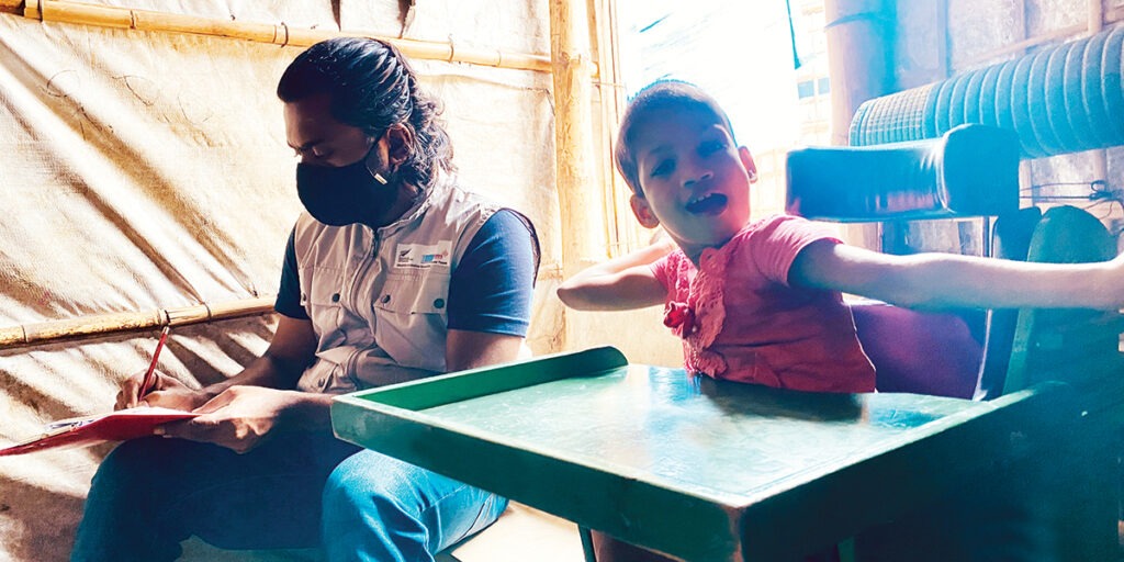 In the refugee camps of Cox's Bazar, Bangladesh, Harisa receives rehabilitation and ongoing treatment for cerebral palsy.