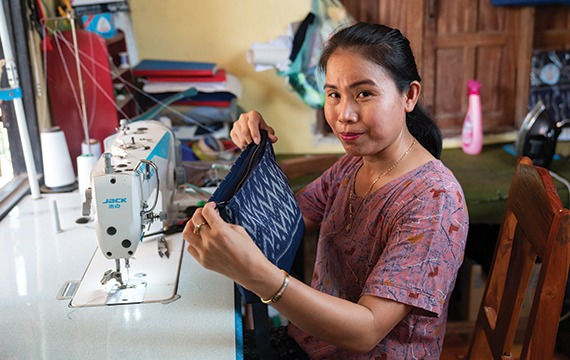 Helping deliver quality inclusive communities and livelihoods for adults, like Kanda, with disabilities living in Laos.